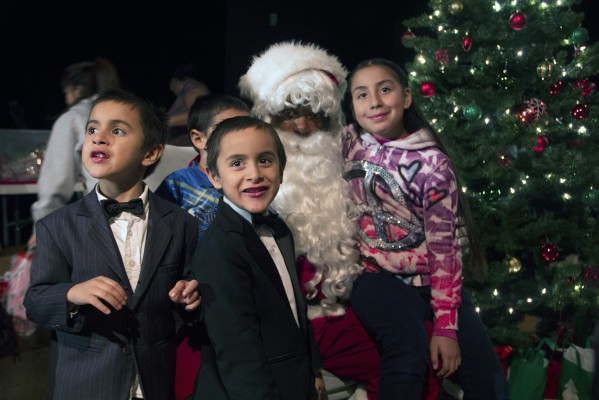 Elva Santos said her kids were most excited to see Santa during the event. (Photo by: Stephen Hobbs)